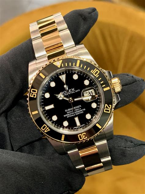 rolex submariner 750 gold|Rolex Submariner gold watch.